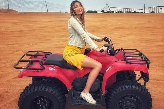 Evening Desert Safari from Dubai with Quad Bike Ride - Belly dance, Tanura, and the fire show under light and sound