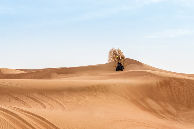 Evening Desert Safari with ATV Quad Bike Dune Bashing BBQ Dinner - The pickup ride into the red dunes: where the mood starts