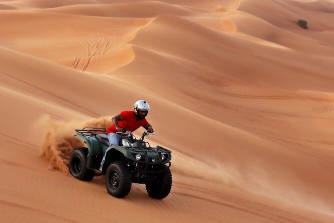 Evening Desert Safari with ATV Quad Bike Dune Bashing BBQ Dinner - ATV quad biking for 30 minutes: the adrenaline you came for