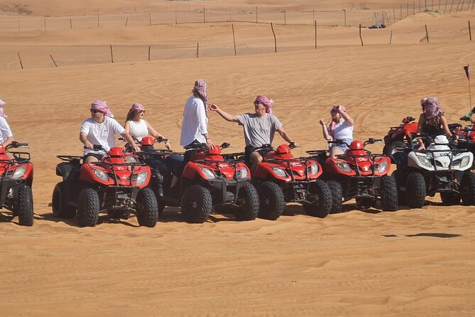 Evening Desert Safari with BBQ Buffet Camel Ride and Arabic Shows - Live Dance Shows: Belly Dance, Fire Dance, Tanoura