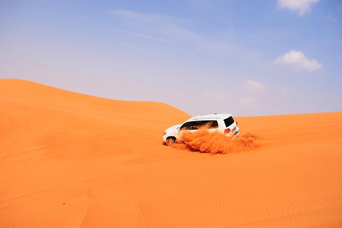 Evening Desert Safari with BBQ Dinner - Shisha, Henna for Ladies, and Arabic Coffee with Dates