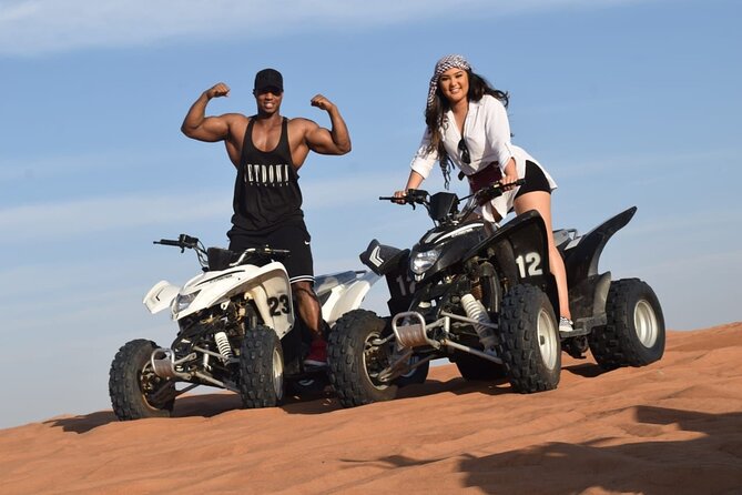 Evening Desert Safari with BBQ Dinner and Live Shows - Dune bashing and sand boarding: the part you remember for years