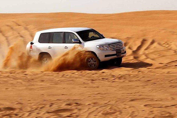 Evening Desert Safari with, Dune Bashing, Camel Ride, sand board - Sunset Photography Points: When the Desert Looks Like It Should