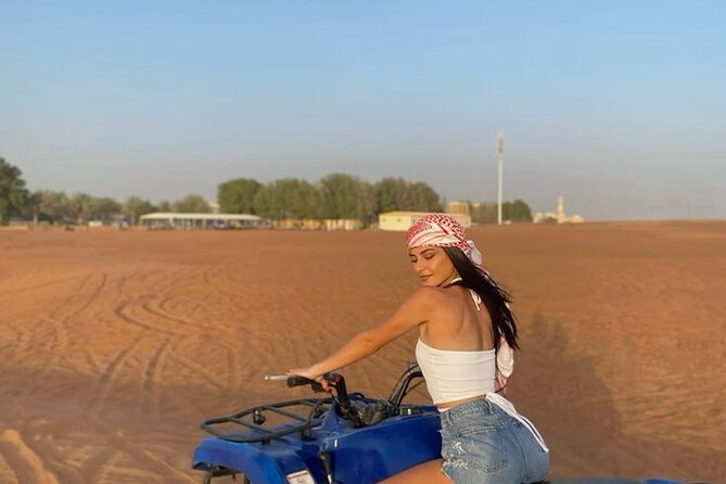 Evening Desert Safari with Quad Bike - Henna painting and local dress photos: small traditions, big memories