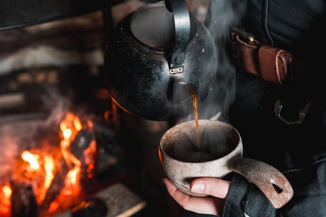 Evening Escape - Snowmobile safari and campfire in Rovaniemi - Gear check: winter clothing plus a guide who teaches first