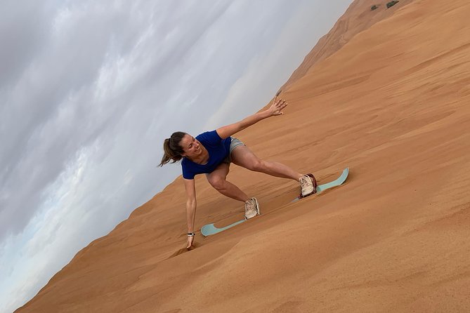 Evening Quad Bike, Desert Safari in Dubai , BBQ Dinner and Shows - Sand Boarding: The Fun Skill You Can Actually Learn Fast