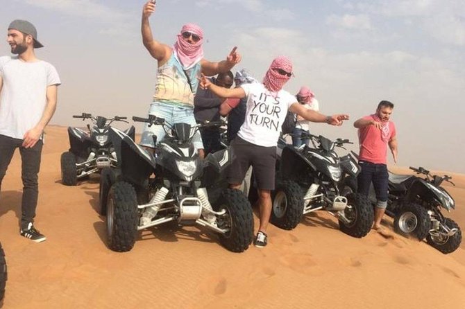 Evening Red Dunes Safari with Quad Biking, BBQ Dinner & LiveShows - Sandboarding: A Quick Add-On That Changes the View