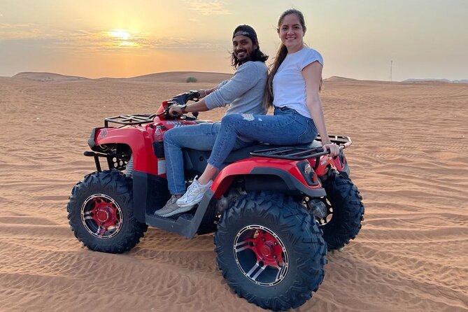 Evening Red Dunes Safari with Quad Biking, BBQ Dinner & LiveShows - Live Shows: Belly Dance, Tanoura, and Fire Dance