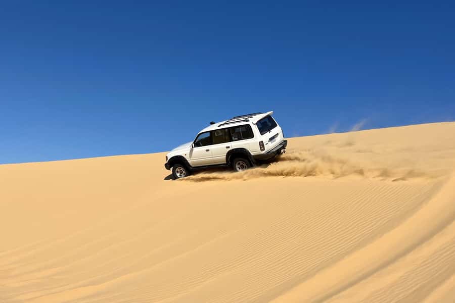 From Cairo: Desert Safari, Camel Ride, Magic Lake, & Lunch - Mudawara Mountains (Jabal El Medawara): the best photos aren’t rushed