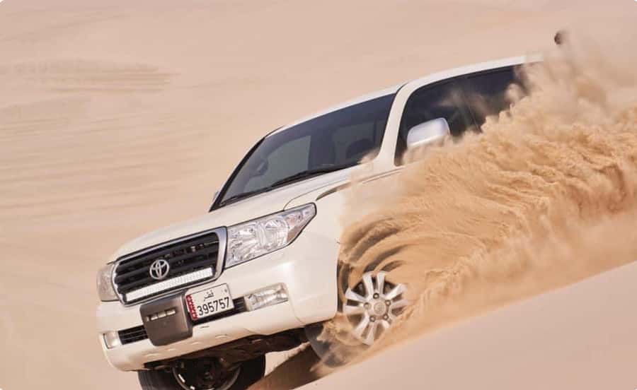 From Doha: Inland Sea Desert Safari with All Activities - Optional quad bikes and photo chances: how to tailor the ride