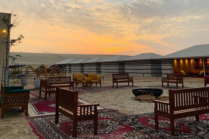 Full-day Qatar desert safari: dune bashing, sandboarding, camels - Sandboarding: the part you’ll either love or want to watch first