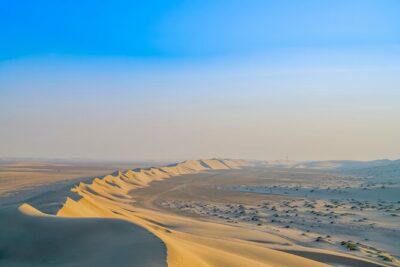 Full-day Qatar desert safari: dune bashing, sandboarding, camels - From Doha pickup to tire deflation: the first 10 minutes matter