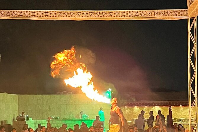 Full Day Safari Grand Adventures with Dune Bash on 4X4 in Dubai - Stop 2 at the camp: henna, sheesha area, and dinner with fire lighting