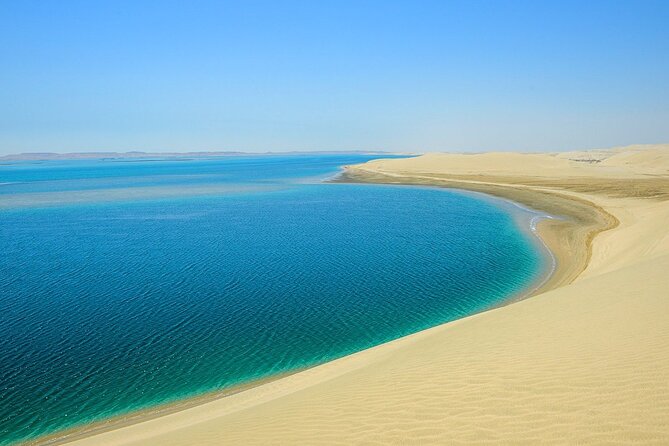 Half Day Desert Safari and Inland Sea - Pickup, drop-off, and comfort: an AC vehicle plus an English guide