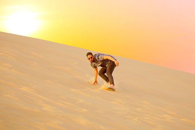 Half-Day Desert Safari from Abu Dhabi - The Shows: Belly Dance, Fire Show, and Tanoura Under Dusk