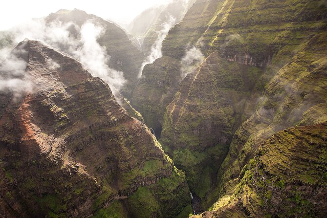 Kauai Deluxe Waterfall Safari: Helicopter Tour - Waimea Canyon, waterfalls, and the interior: seeing Kauai’s “folds” in one pass