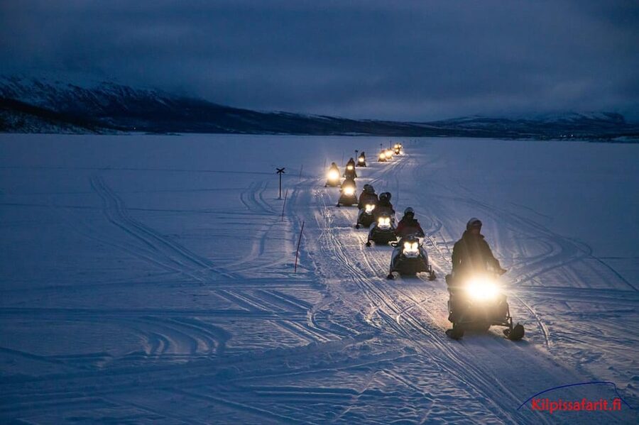 Kilpisjärvi: Border of Three Countries Snowmobile Safari - Koltavuoma’s yellow tri-country cairn: Finland, Sweden, and Norway in one stop