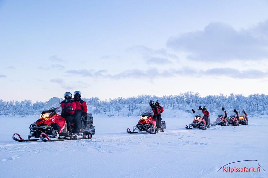 Kilpisjärvi: Border of Three Countries Snowmobile Safari - Hot drink, pastry, and guide-taken photos