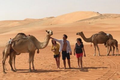 Liwa Full Day Desert Safari (exploring) - Bateen Liwa stop: camel farm time plus a real oasis break