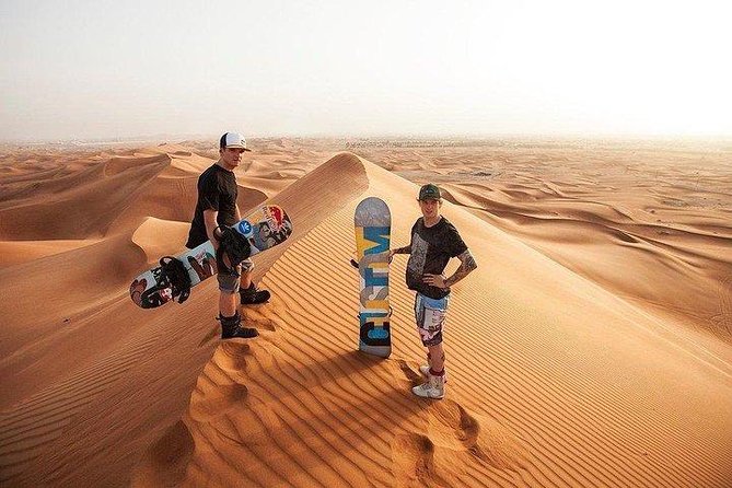 Morning Desert Safari with Quad Bike, Camel Ride & Sandboarding - Morning pickup in Dubai: door-to-door Land Cruiser comfort