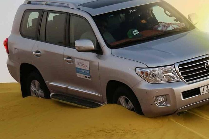 Morning Dubai desert safari - camel rides, quad bikes, dune buggies,dune bashing - Dune bashing in an expert 4x4: the main event done right