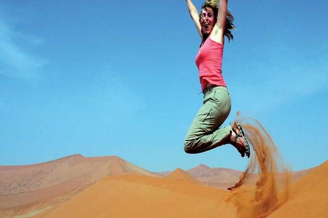Morning Red Dunes Safari: Camel Ride & Sandboarding Adventure - Camel ride reality check: brief, fun, and a little touristy