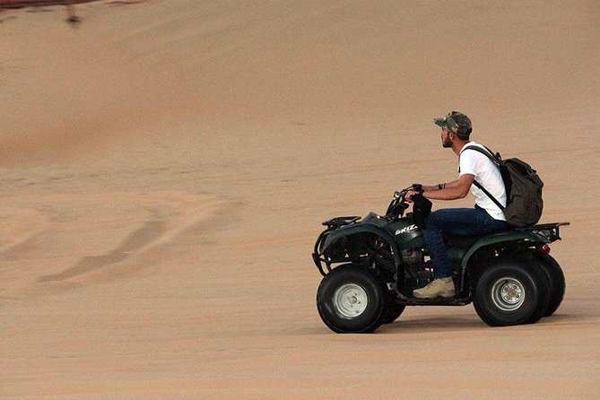 Morning Red Dunes Safari: Quad Biking, Sandboarding & Camel Ride - Camel Ride at Lahbab: The 15-Minute Traditional Contrast