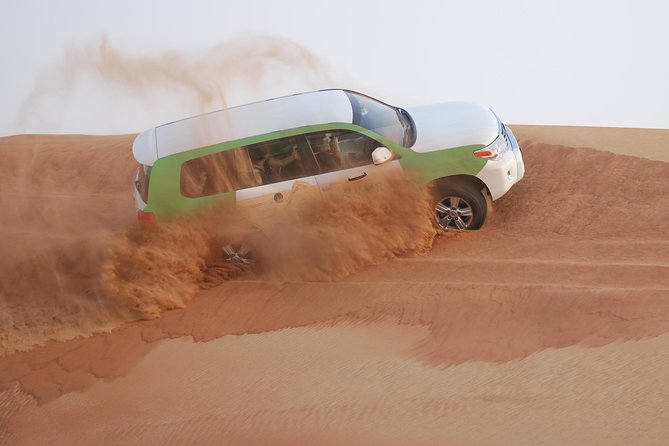 Morning Safari by 4x4 from Dubai with Sand Boarding - Dune bashing in a 4x4: the controlled chaos part