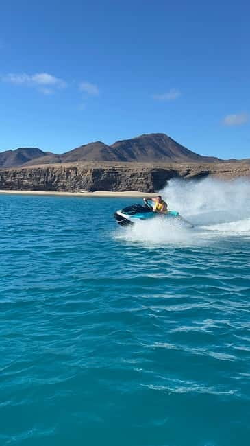 Morro Jable: Guided Jet Ski Safari (without license) - Southern Fuerteventura route: coves, Punta Jandía, and sea-life spotting