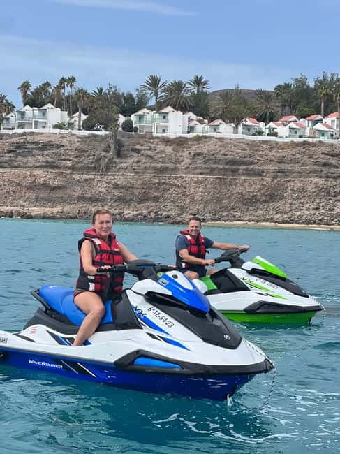 Morro Jable: Guided Jet Ski Safari (without license) - Starting at the Morro Jable Lighthouse: your first minute sets the tone