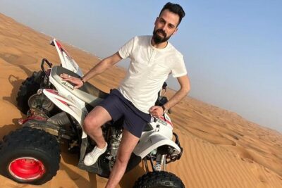 One hour Quad Bike at Red Sand Desert Safari with Camel Ride and BBQ Dinner - Red Sands Dune Bashing: Fast, Bumpy, and Done With a Pro