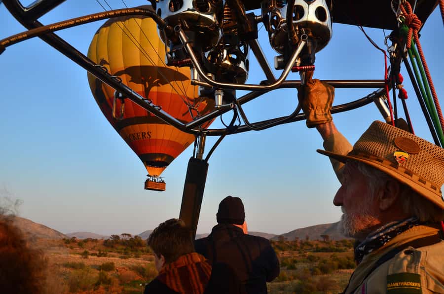 Pilanesberg National Park/Sun City Hot Air Balloon Safari - The early-morning pickup and the open-vehicle run to the launch site