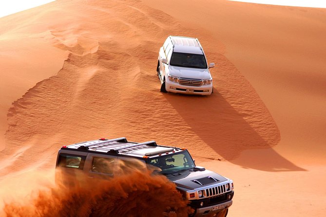 Premium Desert Safari Dubai: Desert Camping & Dune Bashing - The camp rhythm: camel ride, henna, shisha, and costume photos
