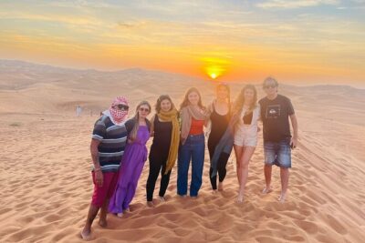 Premium Desert Safari Dubai : Dune Bashing, Camel Ride with BBQ - Dune bashing and sandboarding: the action-packed center of the night