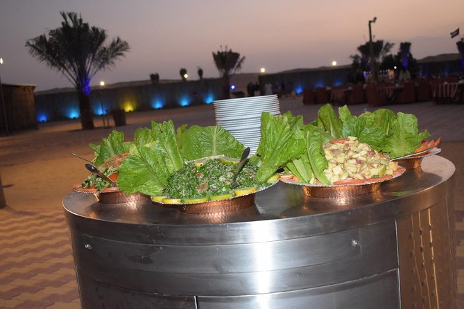 Premium Desert Safari Sharing Transfer with 5<em> Unlimited Buffet – The Shows: Tanoura, Fire, and Belly-Dance Timing’ /><br />
Entertainment is a core part of the package. During dinner, you’ll see multiple live entertainment shows, including Tanoura dancing (the spinning dervish-style performance), belly dancing, and a fire show.</p>
<p><p>In the ideal flow, you watch performers while you eat. It feels like the camp is designed as a full evening event, not a quick photo stop followed by dinner and then you’re gone.</p>
</p>
<p><p>However, there are occasional timing and program differences—sometimes belly dancing has been affected by the evening schedule and religious timing (like Ramadan). Also, some people say not every show hit their personal favorite level, even if the overall experience was fun.</p>
</p>
<p><p>My advice: treat the shows as a bonus, not the only reason to book. The dune driving is your fixed highlight. The performances are the icing, and when the timing is right, they’re memorable.</p>
</p>
<h2 id="value-check-does-70-make-sense-for-a-premium-shared-safari">Value Check: Does $70 Make Sense for a Premium Shared Safari?</h2>
<p><img width="669" height="446" decoding="async" src=