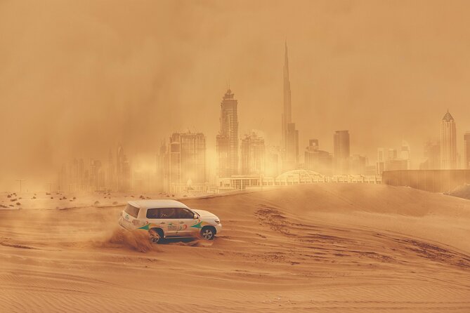Premium Desert Safari with BBQ Dinner - Dubai - Sunset over the desert horizon: the photo moment that feels worth the effort