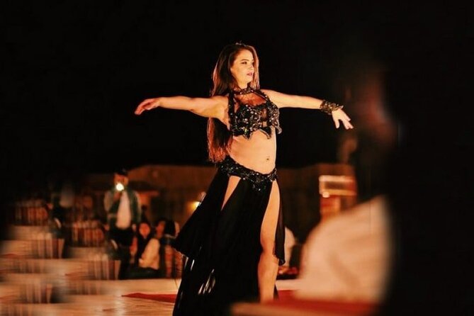 Premium Desert Safari with Dinner, Dunes and Ten Shows (VIP) - Camel Ride: The Calm Counterbalance