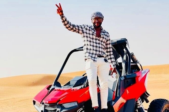 Premium Desert safari With Dune buggy camel ride BBQ dinner - Sandboarding at The Edge of Desert: the included adrenaline reset