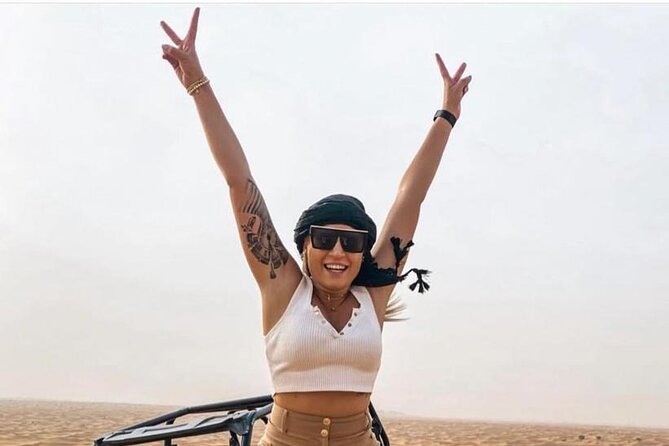 Premium Desert safari With Dune buggy camel ride BBQ dinner - Al Awir camp: camel ride, sunset photos, and live shows
