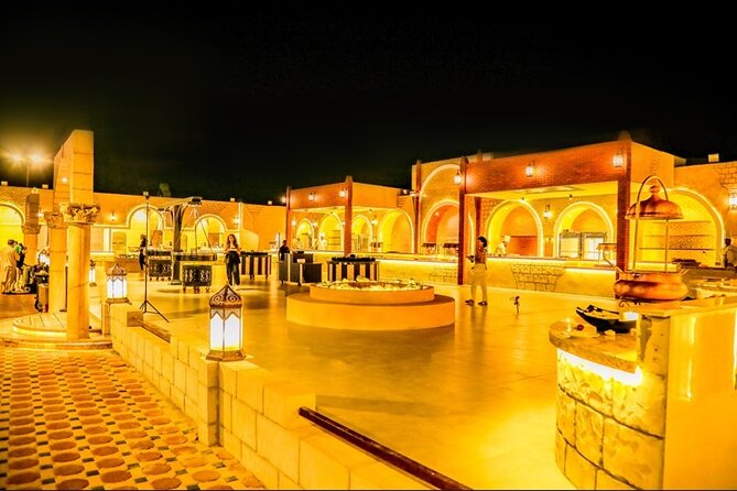 Premium Desert Safari with Live BBQ Dinner and Camel Ride Tour - Fire Show, Belly Dance, and the Desert Evening Atmosphere