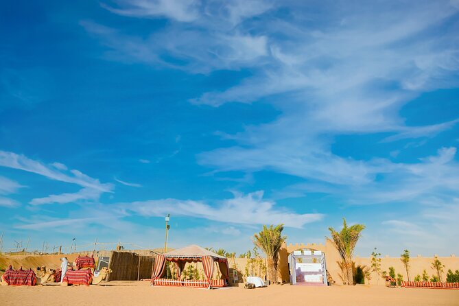 Premium Dubai Desert Safari with Dune Bashing, BBQ, Live Shows - Desert camp energy: coffee, shisha, henna, and that first camel moment