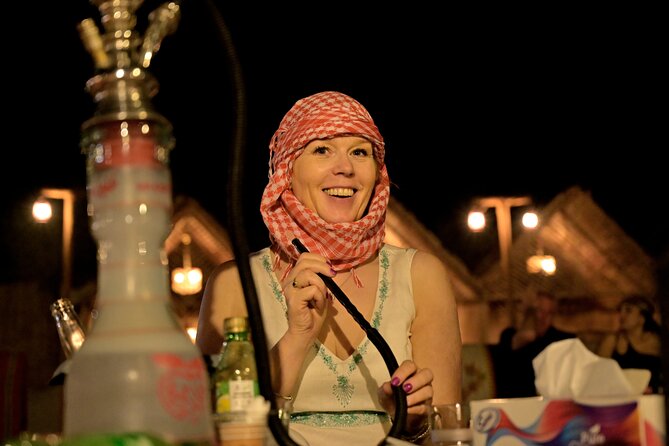 Premium Evening Desert Safari, Quad Bike, Camel & VIP BBQ Dinner - Sandboarding plus the short camel ride: the classic mix