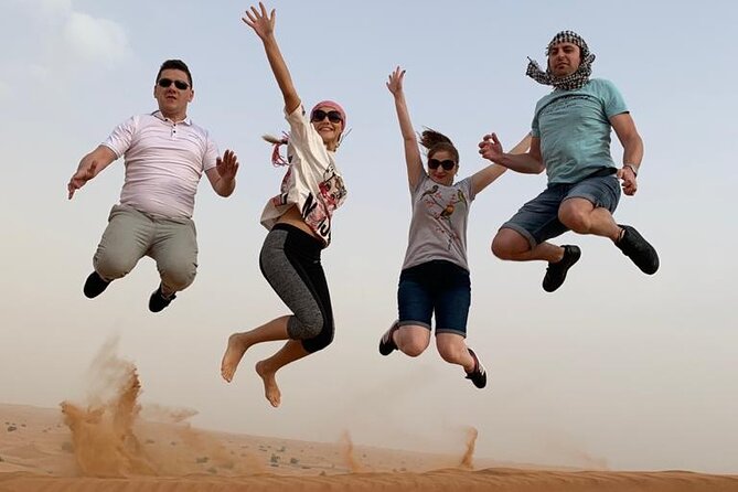 Premium Evening Desert Safari, Quad Bike, Camel & VIP BBQ Dinner - Al Aweer desert camp: shows, henna, and the VIP BBQ atmosphere