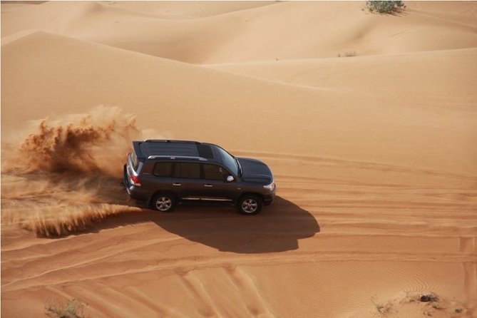 Premium Full-Day Safari, Dune Bash, Camel Ride and BBQ Meal in Desert Camp - Stop 1: Pickup in Doha, then straight to desert time