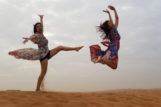 Private 4Hours Red Dunes Safari Camel Ride ,Falcon & Dune Thrills - Sandboarding: the fun you don’t need experience for