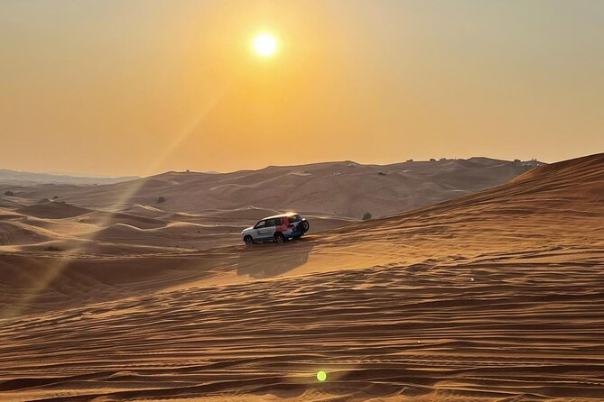 Private Desert Safari Dubai with BBQ Dinner - Sandboarding and dune stops: fun breaks between the thrills