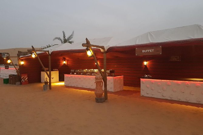 Private Evening Desert Safari with BBQ Dinner Dubai - BBQ dinner with live shows: tanoura, belly dancing, and a fire moment