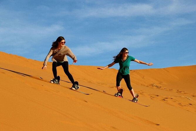 Private Evening Red Sand Desert Safari with BBQ Dinner - The camp welcome: coffee, dates, photos, and a calm pause