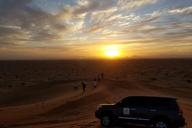 Private Evening Red Sand Desert Safari with BBQ Dinner - Camel ride and henna painting: short activities that add meaning