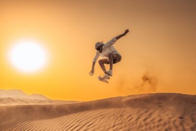 Private Sunset Desert Safari:SandSurfing, Camel Ride & BBQ dinner - 4:00pm pickup and the comfortable drive into the desert